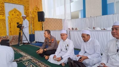 Polresta Barelang Melakukan Pengamanan Haul Akbar Ke-XV Jamaah Al Khidmah Kota Batam di Masjid Sultan Mahmud Riayat Syah Batu Aji - Kota Batam .